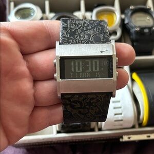Nike with the leather band perfect watch works good